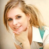 A picture of Helen Golubeva, who is a woman with blonde hair.